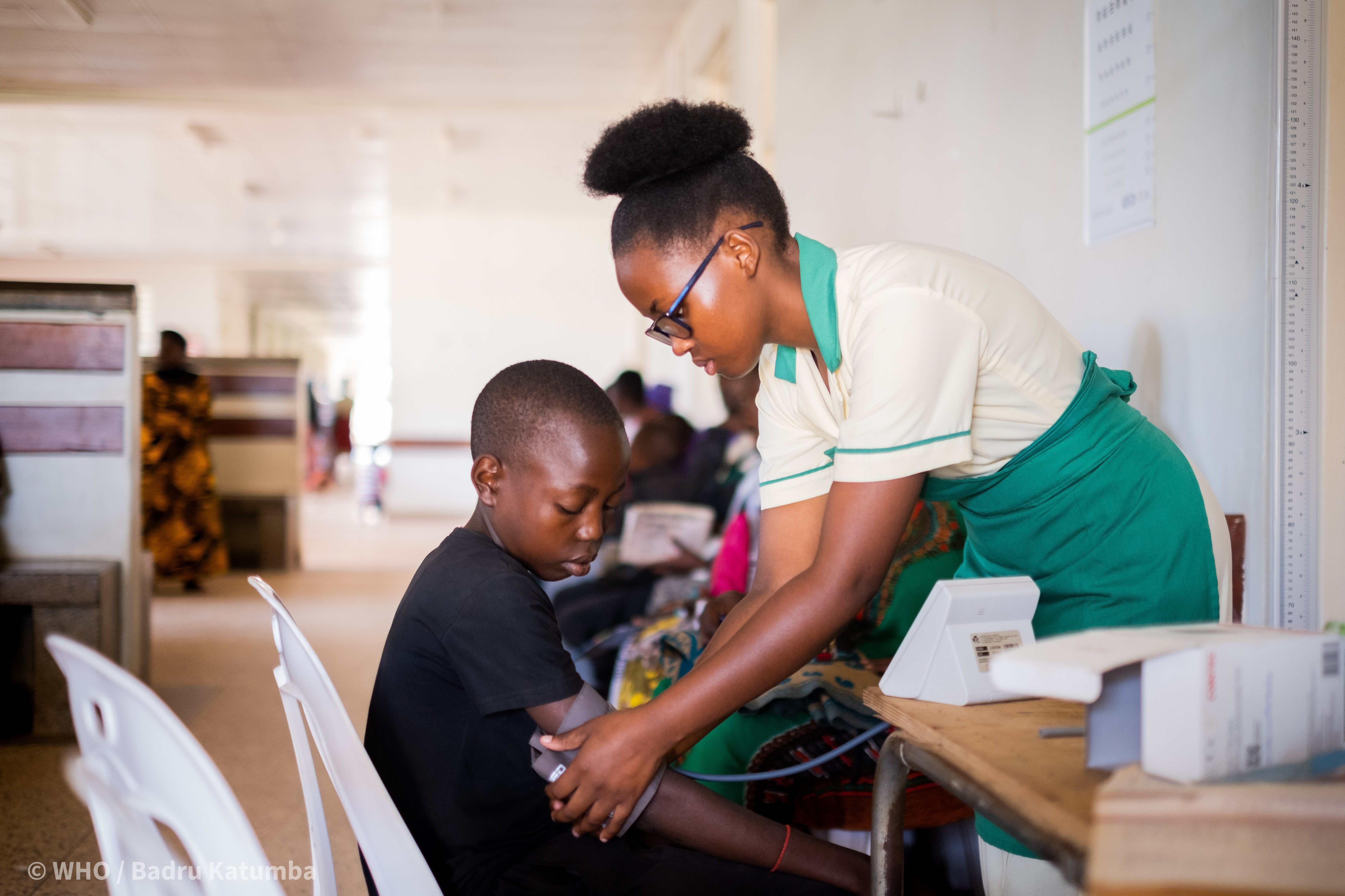 ncds uganda child health A nurse measures a child's blood pressure in Uganda